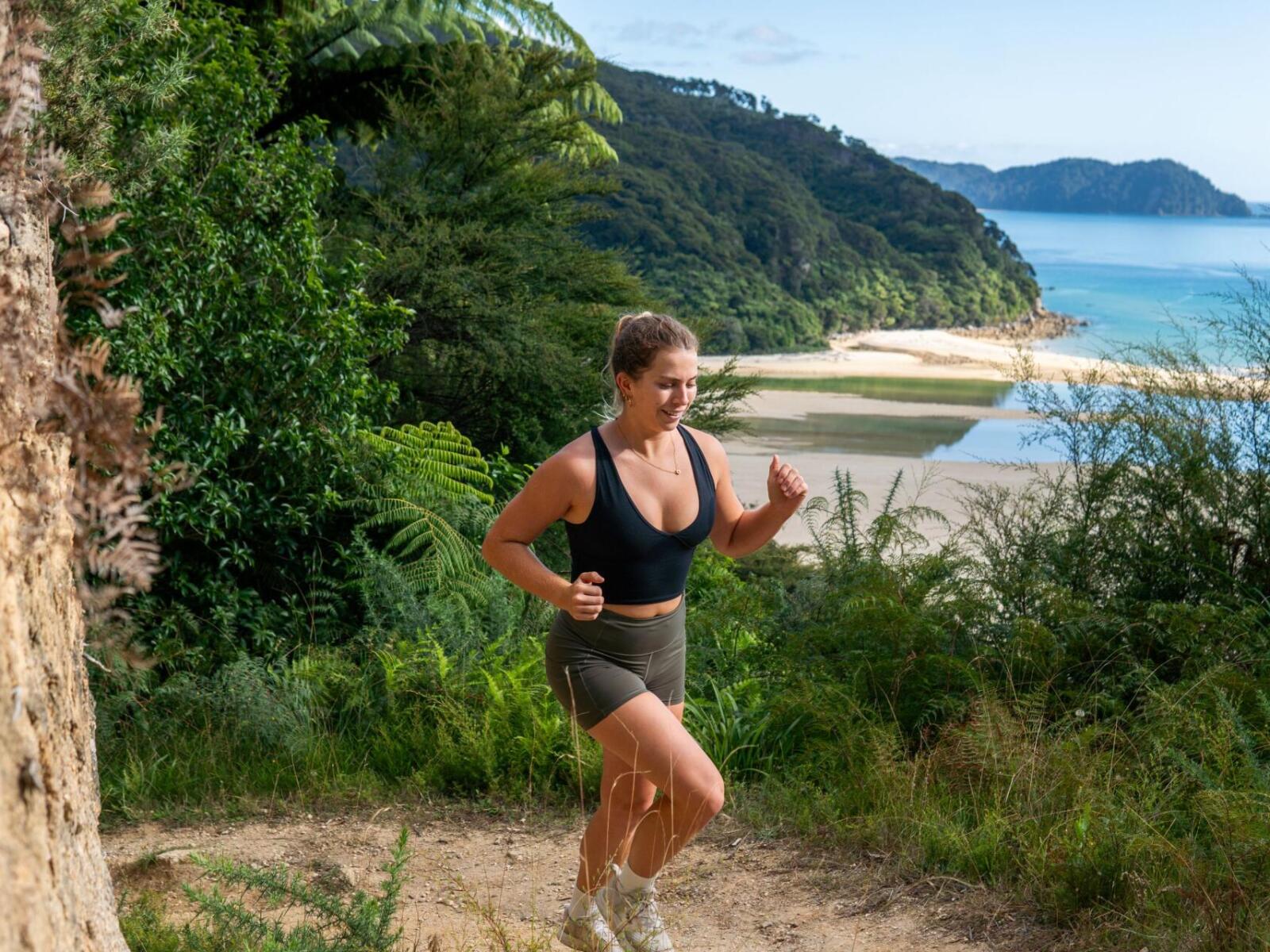 Using a phone app on the Abel Tasman Coast Track